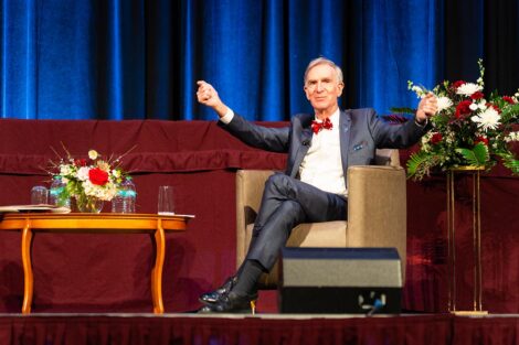 Bill Nye gesticulates