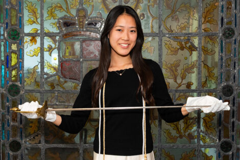 Yuko Tanaka '26 holds sword.