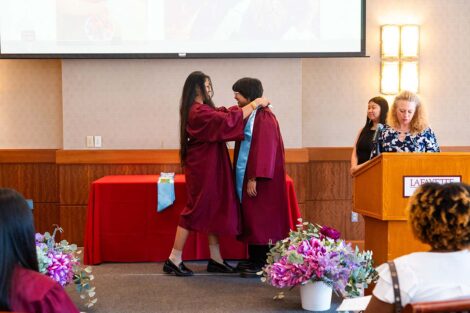 A student gets their cords at Pan-Asian Celebration