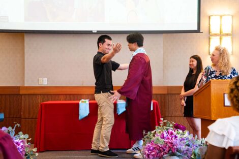 A student gets their cords at Pan-Asian Celebration