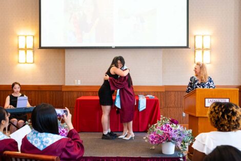 A student gets their cords at Pan-Asian Celebration