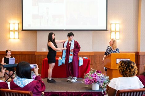 A student gets their cords at Pan-Asian Celebration