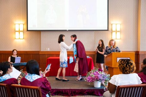 A student gets their cords at Pan-Asian Celebration
