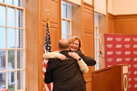 Bob Sell hugs President Nicole Hurd