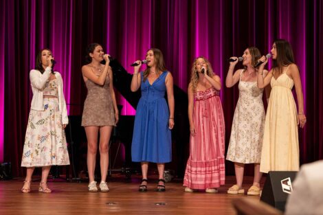 A singing group performs at Baccalaureate