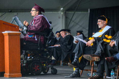 Dexter Kennedy speaks at the podium during Commencement.