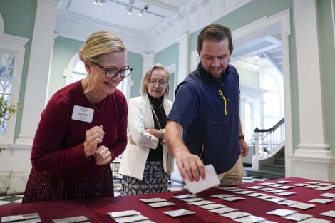 Attendees get their nametags