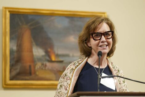 Laura McGrane speaks at the event