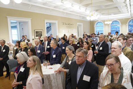 The crowd listens to speakers