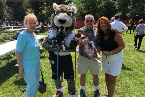 The Lafayette leopard joins two grandparents and a parent at Move In.