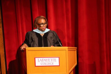 A speaker at the Donning of the Kente