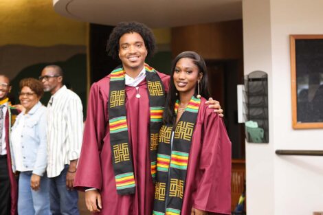Two students at Donning of the Kente