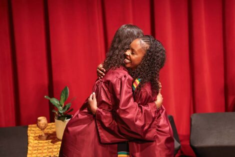 A student receives a stole at the Donning of the Kente