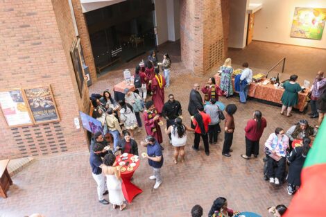 A crowd outside the Donning of the Kente
