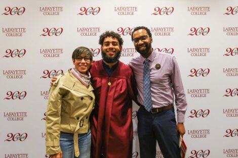 A student poses with others at Unidos en Celebración