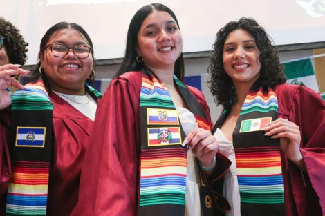 Students pose with their sashes at Unidos en Celebración