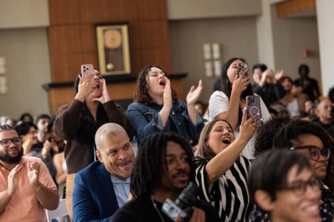 Attendees cheer at Posse Celebration