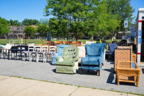 Rows of chairs sit outside of the West Ward Sale