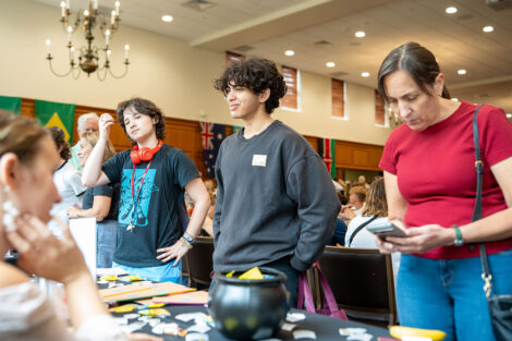 New students and their family members participate in the Resource Fair in Marquis Hall during Move-in.