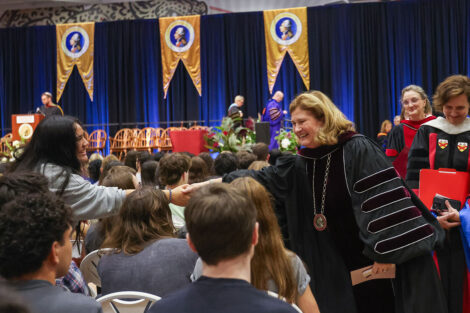 Lafayette College President Nicole Hurd greets a student at Convocation.