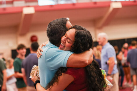 Families embrace after Convocation.