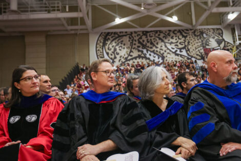 Members of the faculty look on during the program at Convocation.