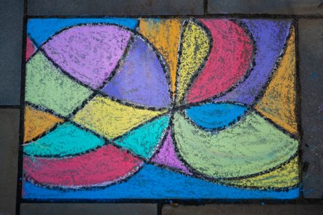 A colorful chalk design is featured at McKelvy Scholar's ChalkFest.