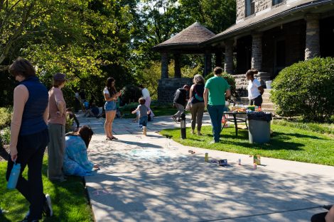 Families and neighbors participate in ChalkFest at McKelvy House.