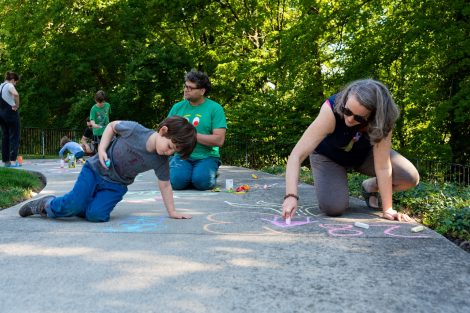 Parents and kids share creativity during ChalkFest.