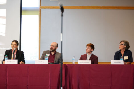 Rachel Goshgarian (left), associate professor of history, Chris Phillips, professor of English, Mathieu Smith-Perrot, associate professor of French and Elaine Stomber, Co-Director of Special Collections & College Archives; college archivist