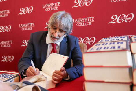 Akhil Reed Amar signs copies of his latest book