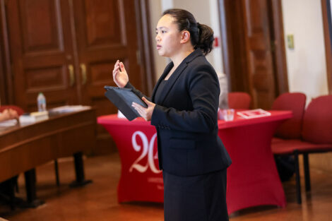 Stephanie Chan, assistant professor of government and law presents at the symposium