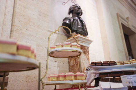 A bust of the Marquis de Lafayette rests in the background at the post-symposium reception in Kirby Hall of Civil Rights. Photos by JaQuan Alston and Ashli Truchon Novak